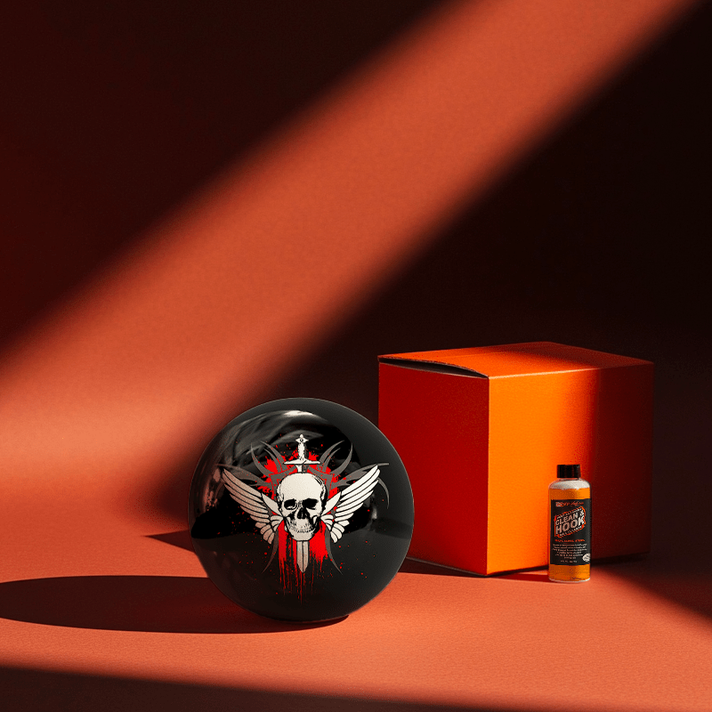 Hands holding a red orb with intricate, patterned artwork depicting a figure with sunglasses.