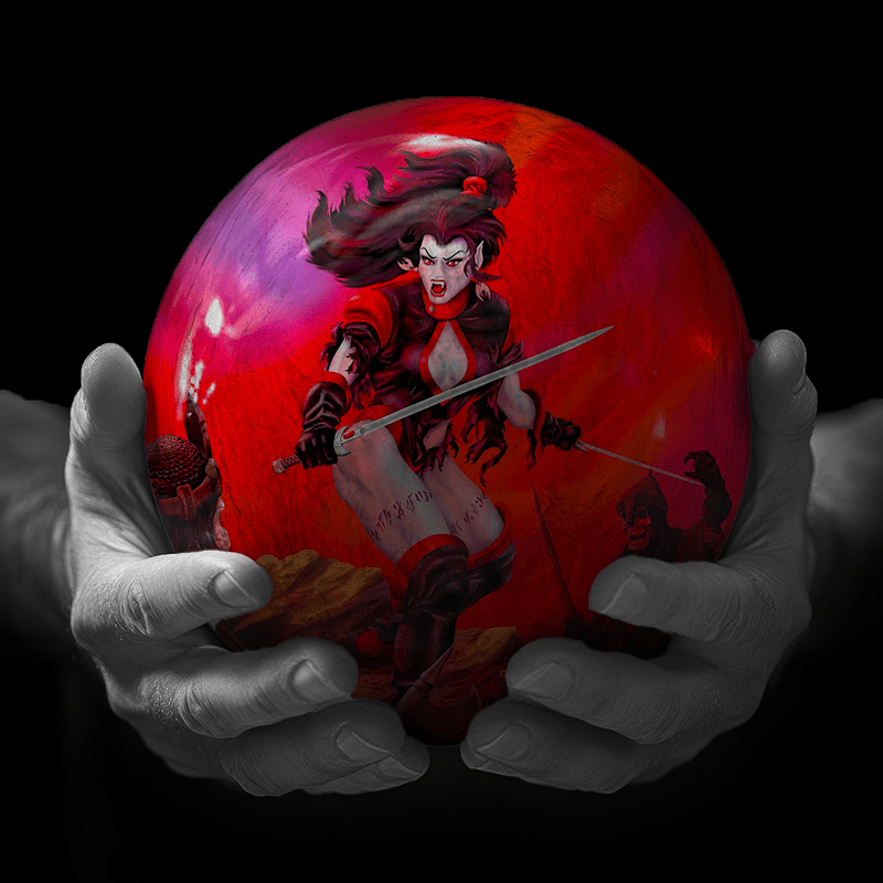 Hands holding a red sphere featuring a floral-patterned figure.