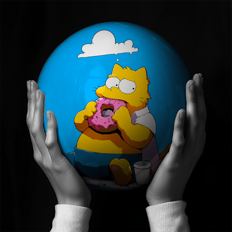 Hands holding a red sphere featuring a floral-patterned figure.