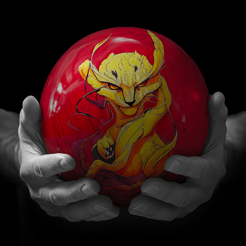 Hands holding a red sphere featuring a floral-patterned figure.