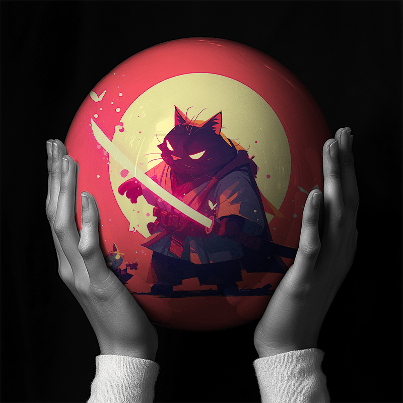 Hands holding a red sphere featuring a floral-patterned figure.